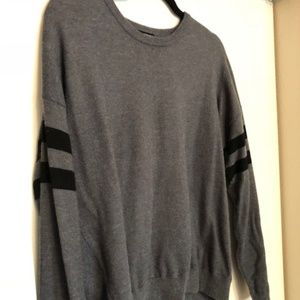 Grey sweater with black stripes